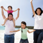 asian-family-on-beach